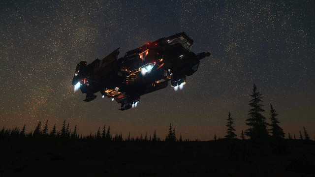 Image: An industrial mining space-ship floats on blue-flamed thrusters in the night sky above a pine-forested mountain.