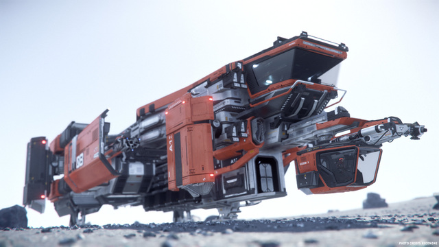 Image: An orange MOLE Mining ship's pilot canopy and main laser are seen from the front.